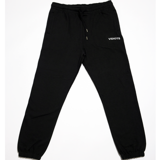 Black sweatpant with white "Vidiots" text under pocket. 